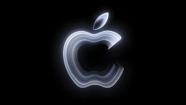 Siyah arka plan üzerinde ışıklı Apple logosu