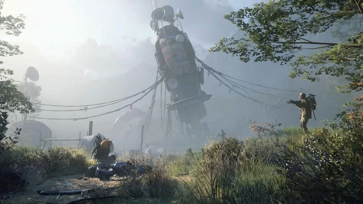 Arc Raiders'ta geniş bir arazide mekanik yapıya bakan karakterler