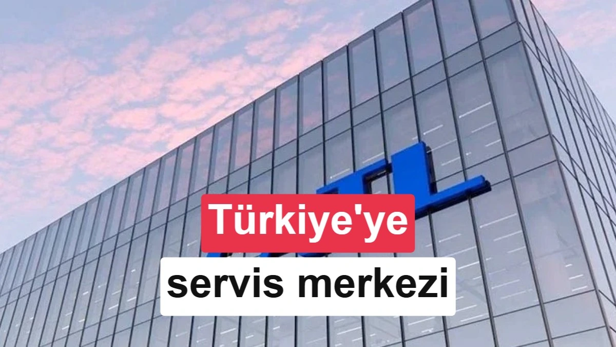 Cam cepheli bir binanın ön cephesinde CATL yazısı