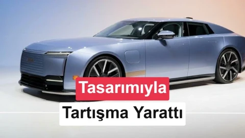 Açık mavi elektrikli Jaguar Type 01 otomobilinin önden ve yandan görünümü