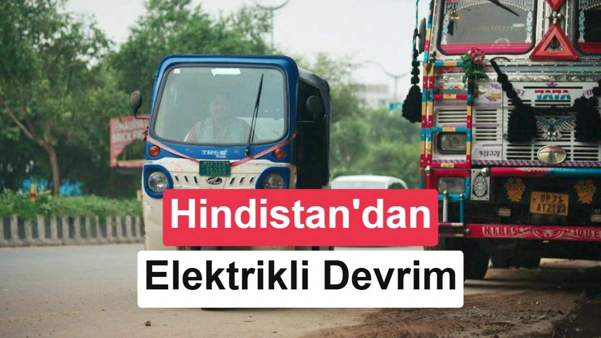 Hindistan’da yolda bir tuk-tuk ve bir ticari araç; görselde elektrikli araç dönüşümüne dikkat çekiliyor