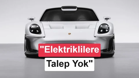 Beyaz Porsche konsept otomobilinin önünde elektrikli otomobillere talep olmadığı mesajı yer alıyor