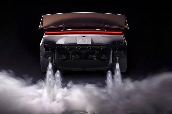 Arka bölümündeki iticilerden gaz püskürten Tesla Roadster