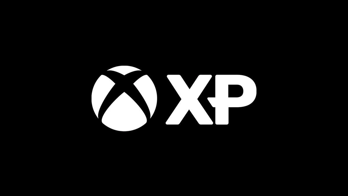 Siyah zemin üzerinde beyaz Xbox simgesi ve XP harfleri