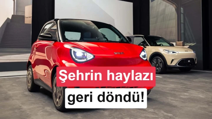 Kırmızı Smart #2 elektrikli otomobil, kapalı bir alanda önden ve yandan görünümüyle sergileniyor